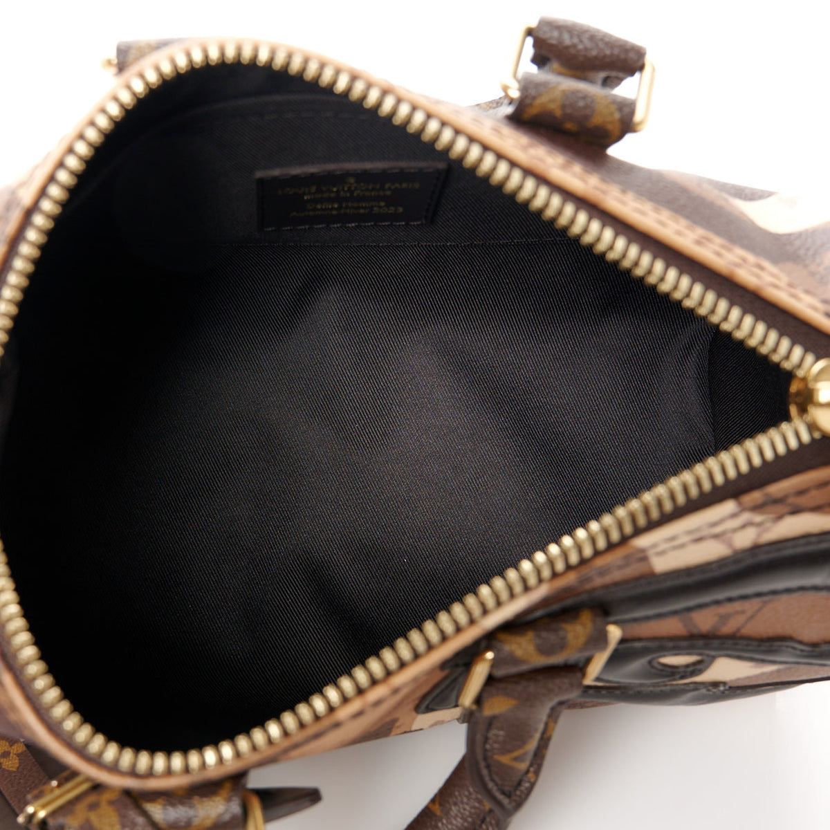 LOUIS VUITTON
Monogram Portrait Keepall Bandouliere 25 Brown
